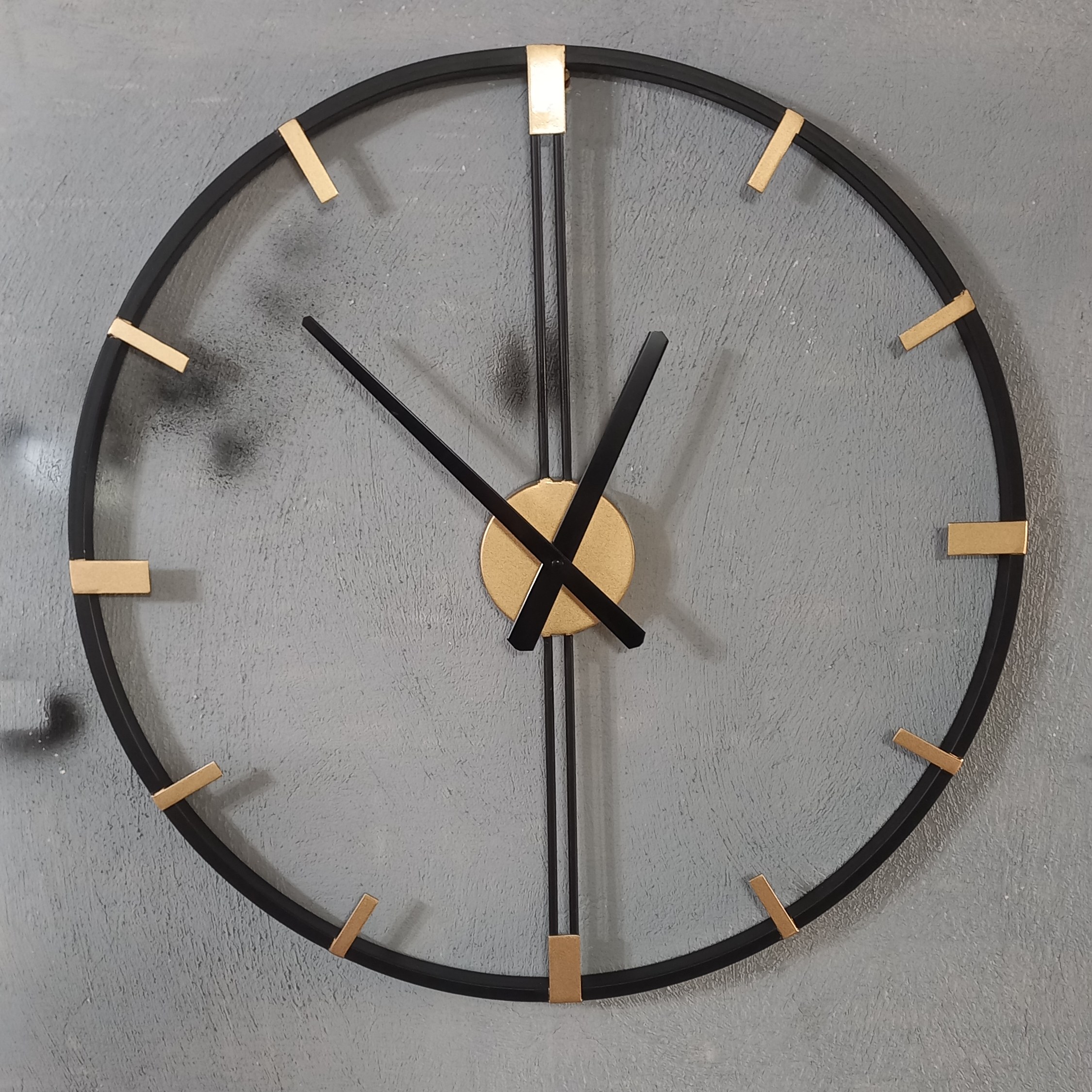 ساعت فلزی مشکی طلایی 