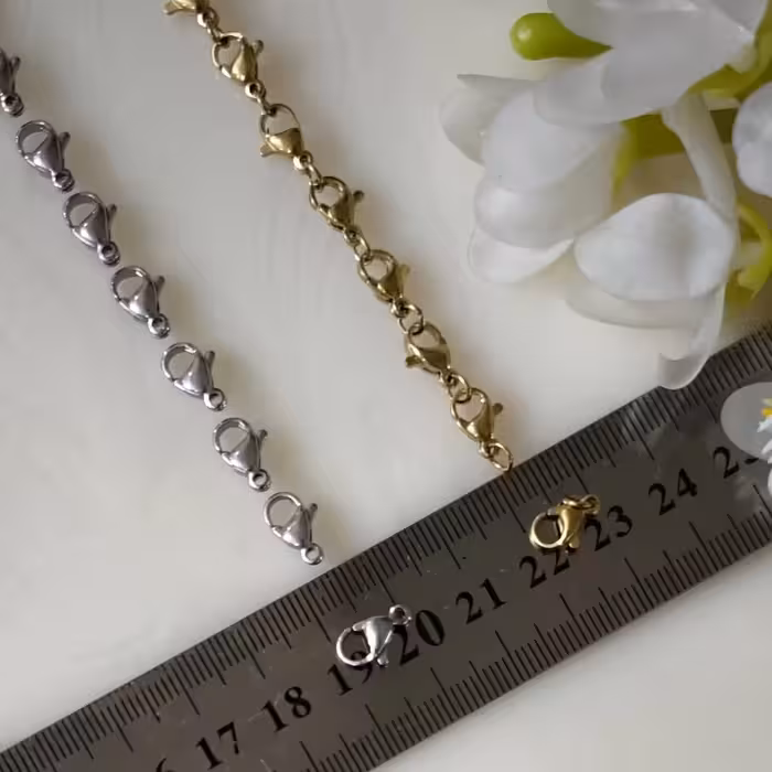 قفل طوطی استیل رنگ ثابت کوچک (فروش بصورت بسته 50 عددی)