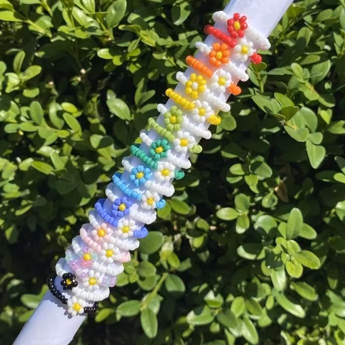 انگشتر های گل با رنگبندی متنوع جنس کار ها منجقی است و کار دسته