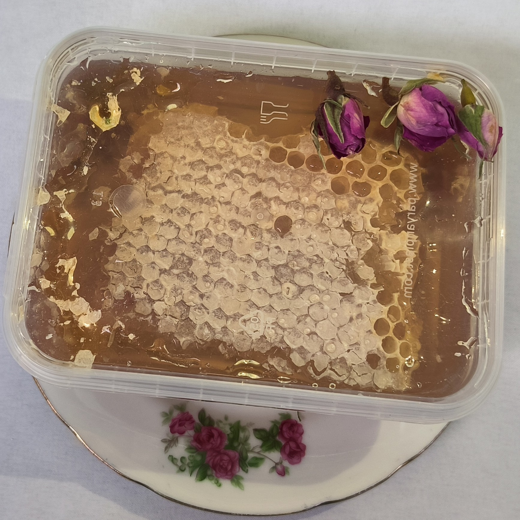 عسل طبیعی موم دار خوانسار نیم کیلویی