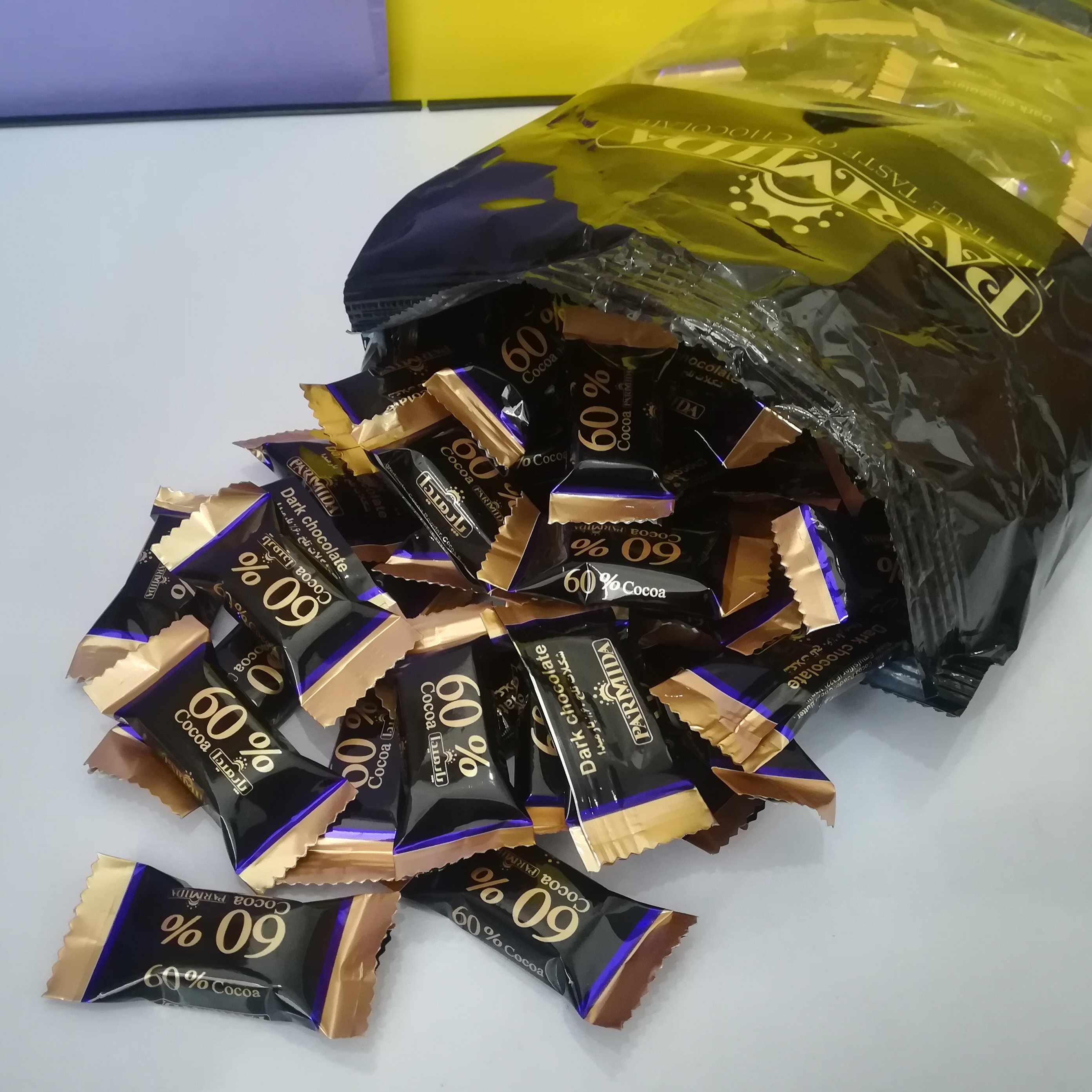 کاکائو تلخ 60 درصد پارمیدا 250 گرمی(دارای سیب سلامت،مجوز بهداشت)طعم واقعی شکلات