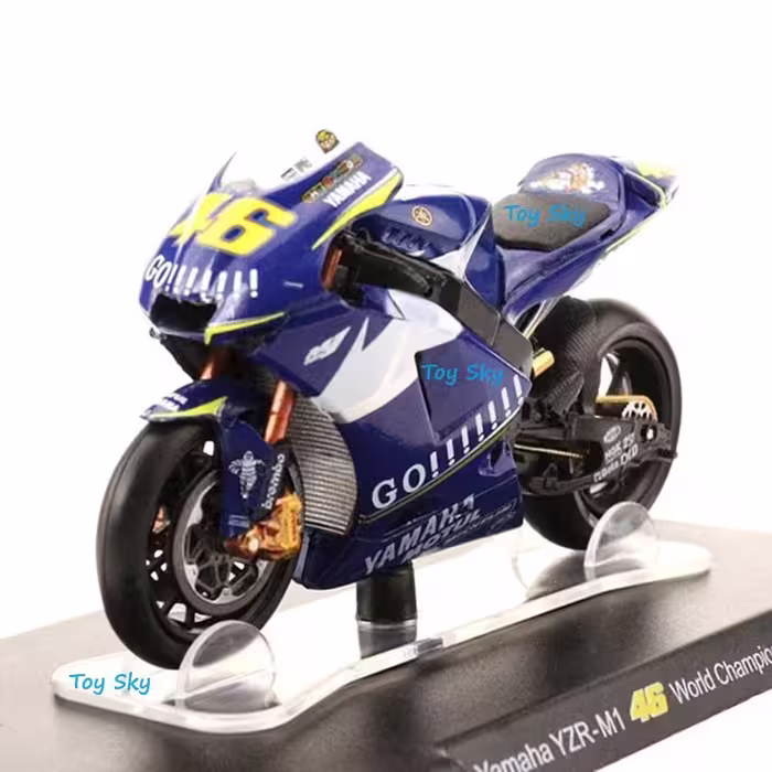 ماکت موتور - یاماها YZR M1 قهرمان جهان 2005 - مقیاس 1.18 Leo Models - فلزی - فرمان پذیر - تعلیق چرخ عقب - دارای استند