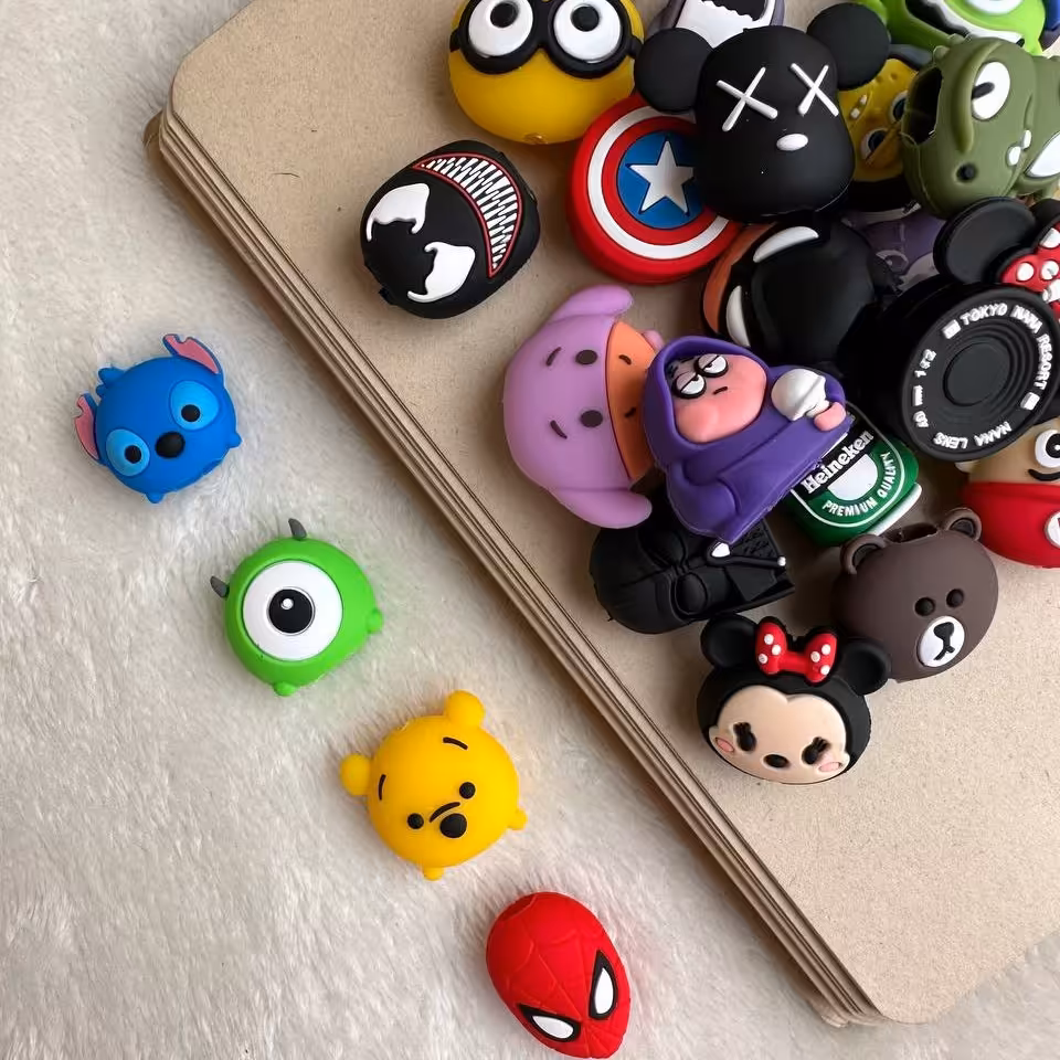 محافظ کابل و سیم شارژر جنس سیلیکونی اورجینال در 26 طرح جذاب سفارش بصورت دوتایی