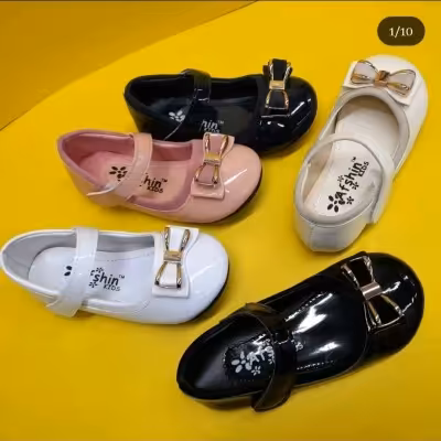 دخترانه عروسکی ورنی پاپیون طلایی