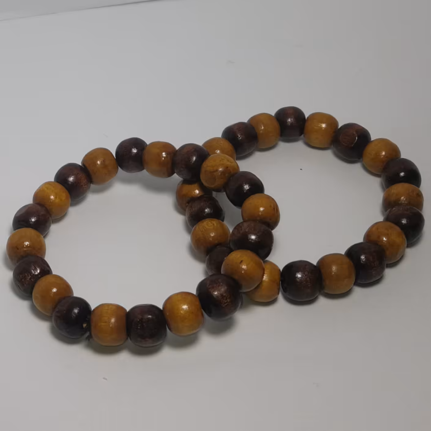 دستبند طرح چوب دورنگ قهوه ای تیره و عسلی 