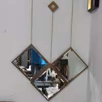 تابلو آینه ای زنجیری 3عددی سفید‌طلایی سایز 26سانت وزنجیر 50سانت