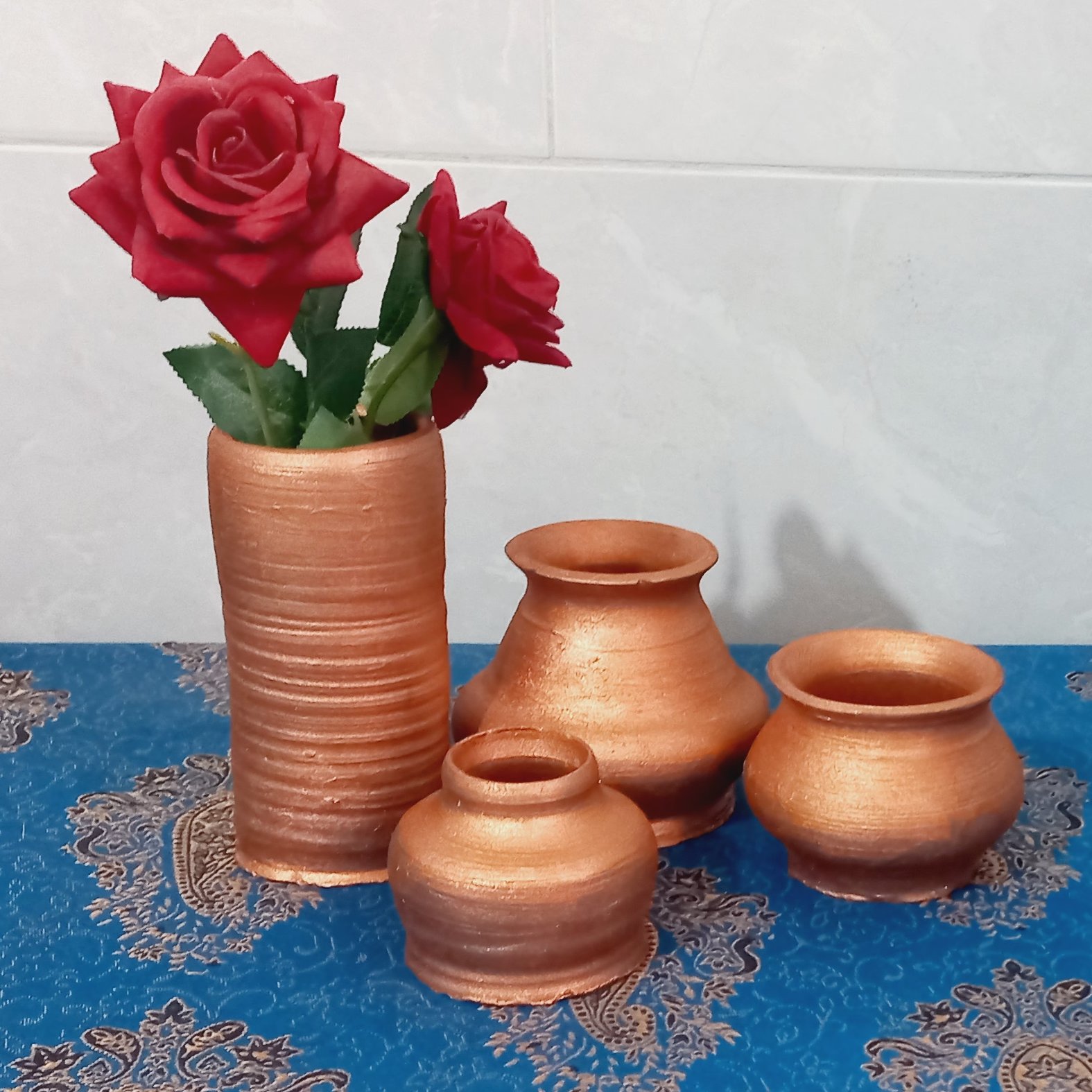 ست گلدان سفالی به رنگ مسی قابل شستشو هست