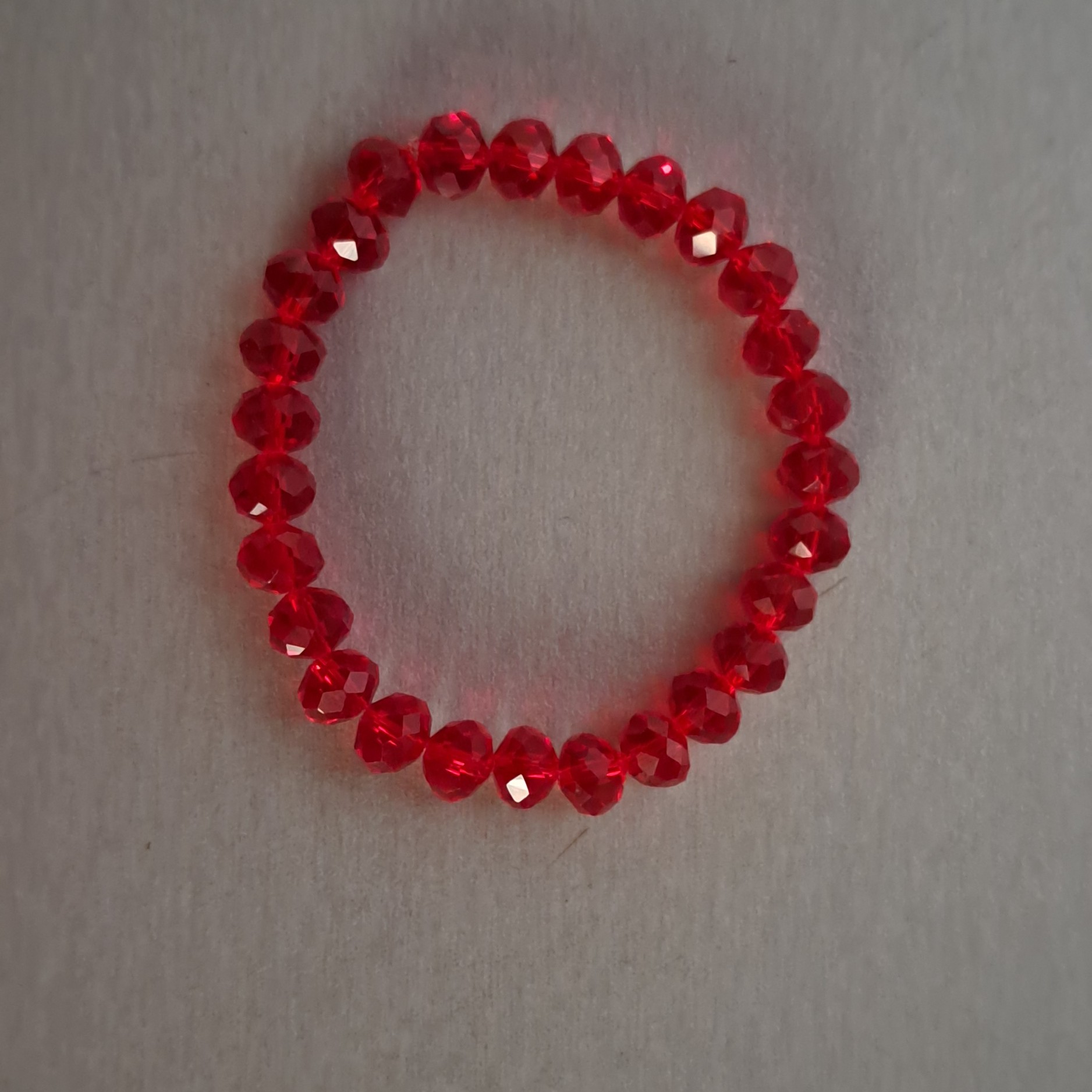 دستبند قرمز رنگ با مهره های الماسی سایز بزرگ 