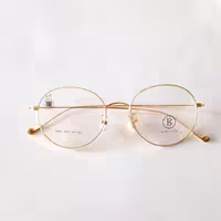 عینک طبی گرد جنسیت فریم تمام قاب فلزی قابلیت ساخت انواع عدسی طبی را دارد