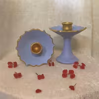 شمعدان سفالی پایه دار . رنگ آبی- طلایی . سایز متوسط (پس کرایه)