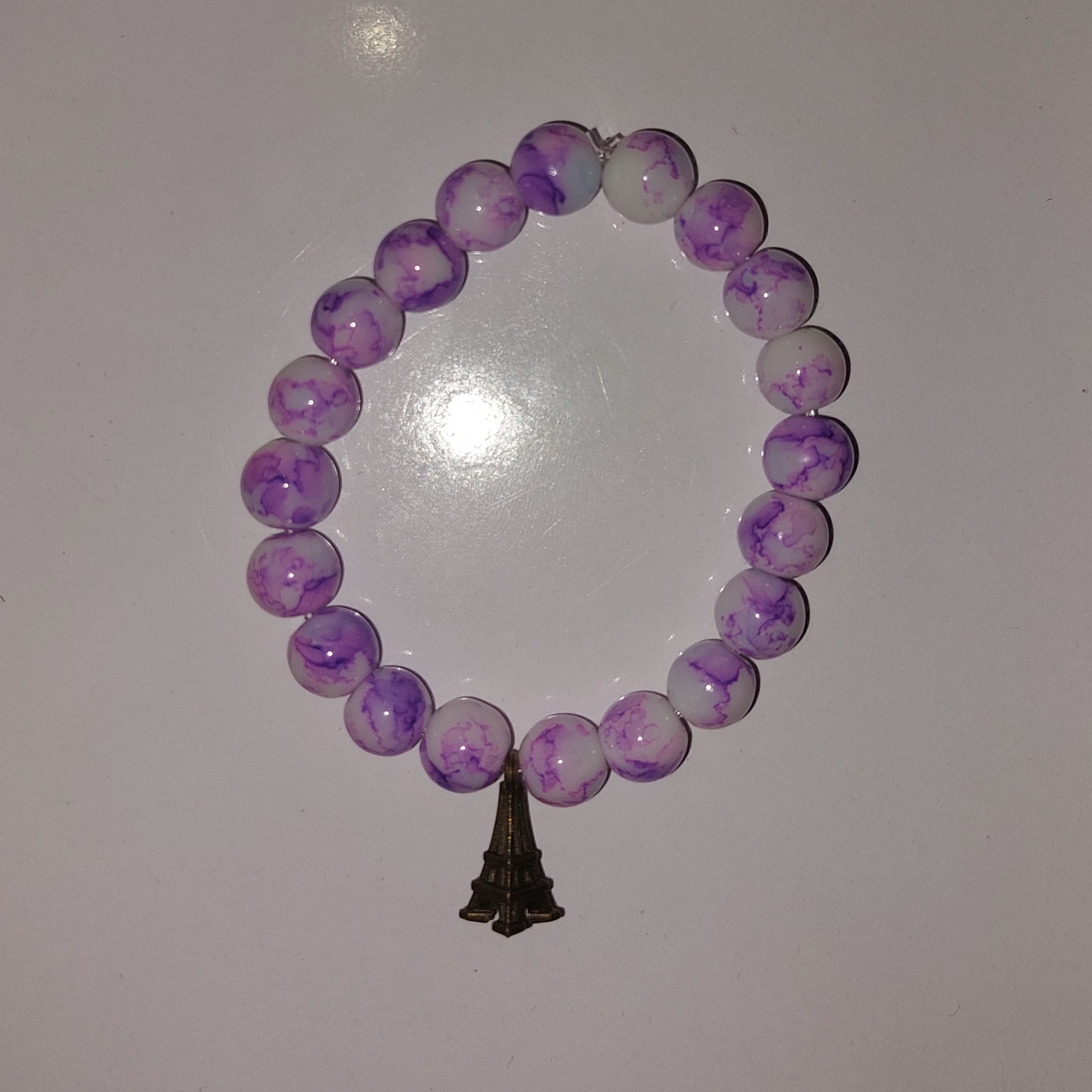 دستبند کشی صورتی  ابر و بادی مدل برج ایفل