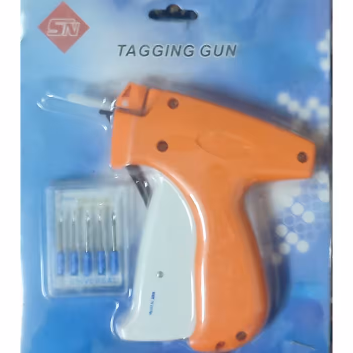 تفنگی اتیکت زن همراه با پنج عدد سوزن یدک TAGGING GUN