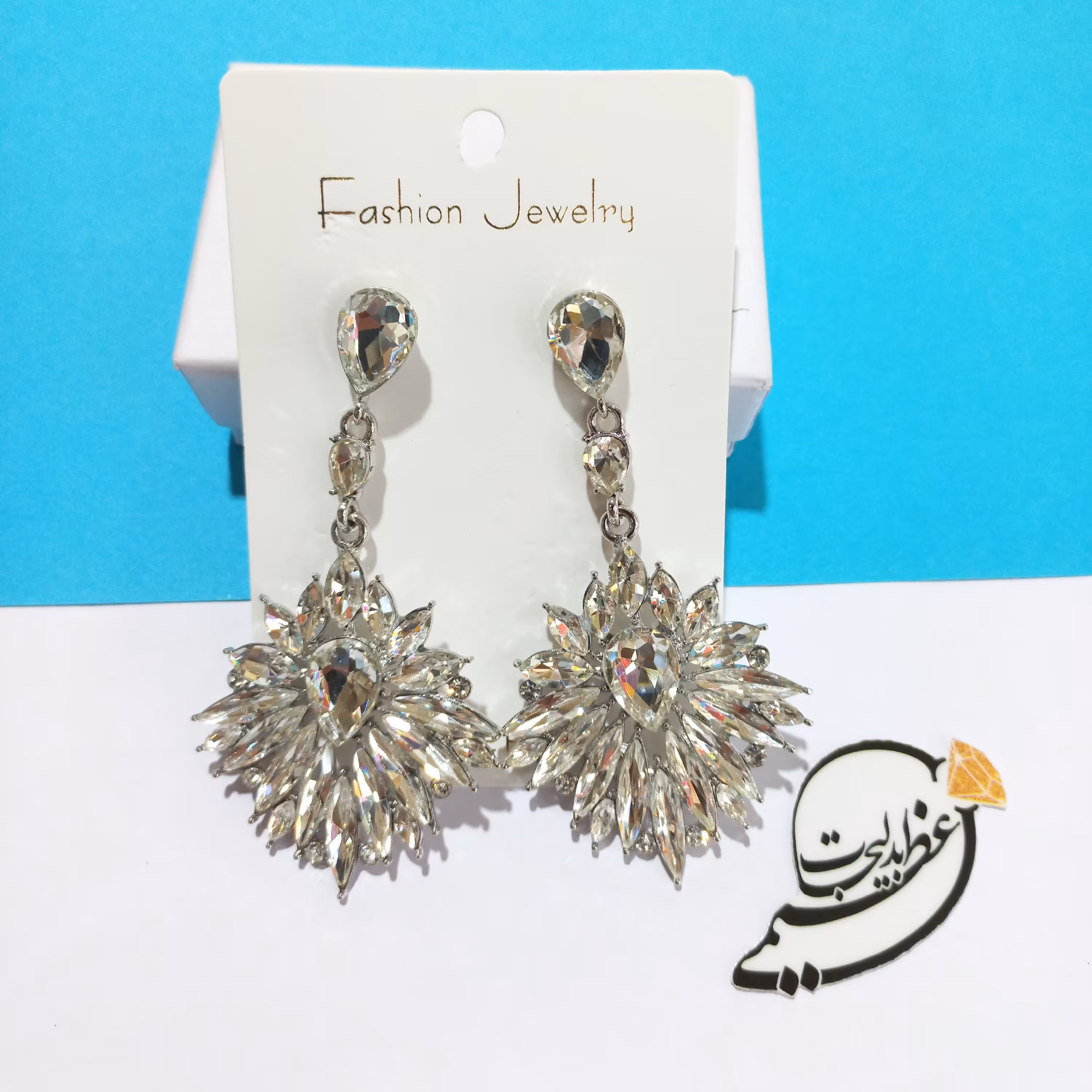 گوشواره مجلسی سلطنتی و جواهری آویز بسیار زیبا  با نگین های  سفید  کد 270