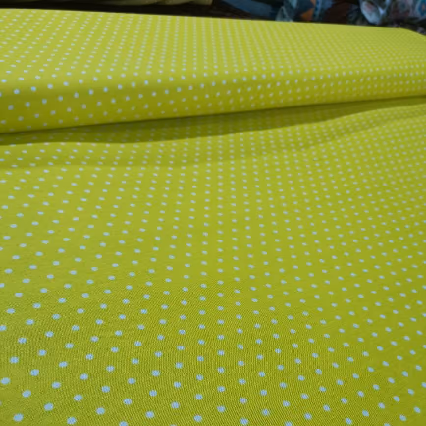 پارچه آشپزخانه و ملحفه زمینه زرد خالدار