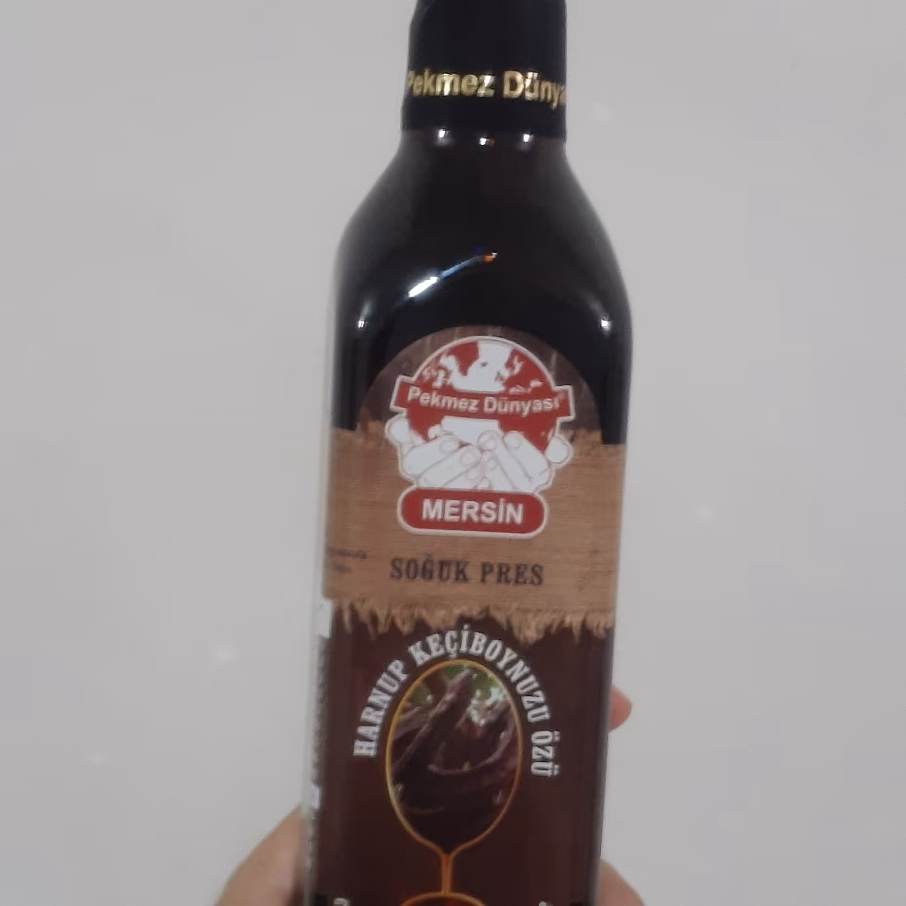 میوه خرنوب عصاره شهد و شیره شربت غلیظ میوه درخت مدیترانه ای