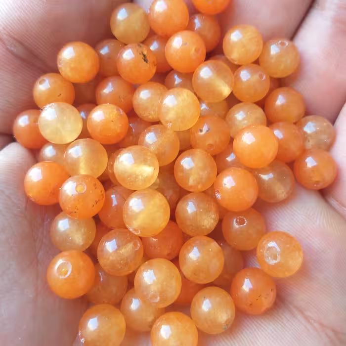 مهره سنگ آونتورین پرتقالی  اصل و معدنی بدون رنگ شدگی و احیا با بهترین کیفیت و قیمت برای 1 عدد مهره میباشد 