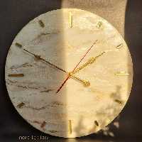 ساعت دیواری رزینی طرح مرمر با موتور آرامگرد و بیصدا