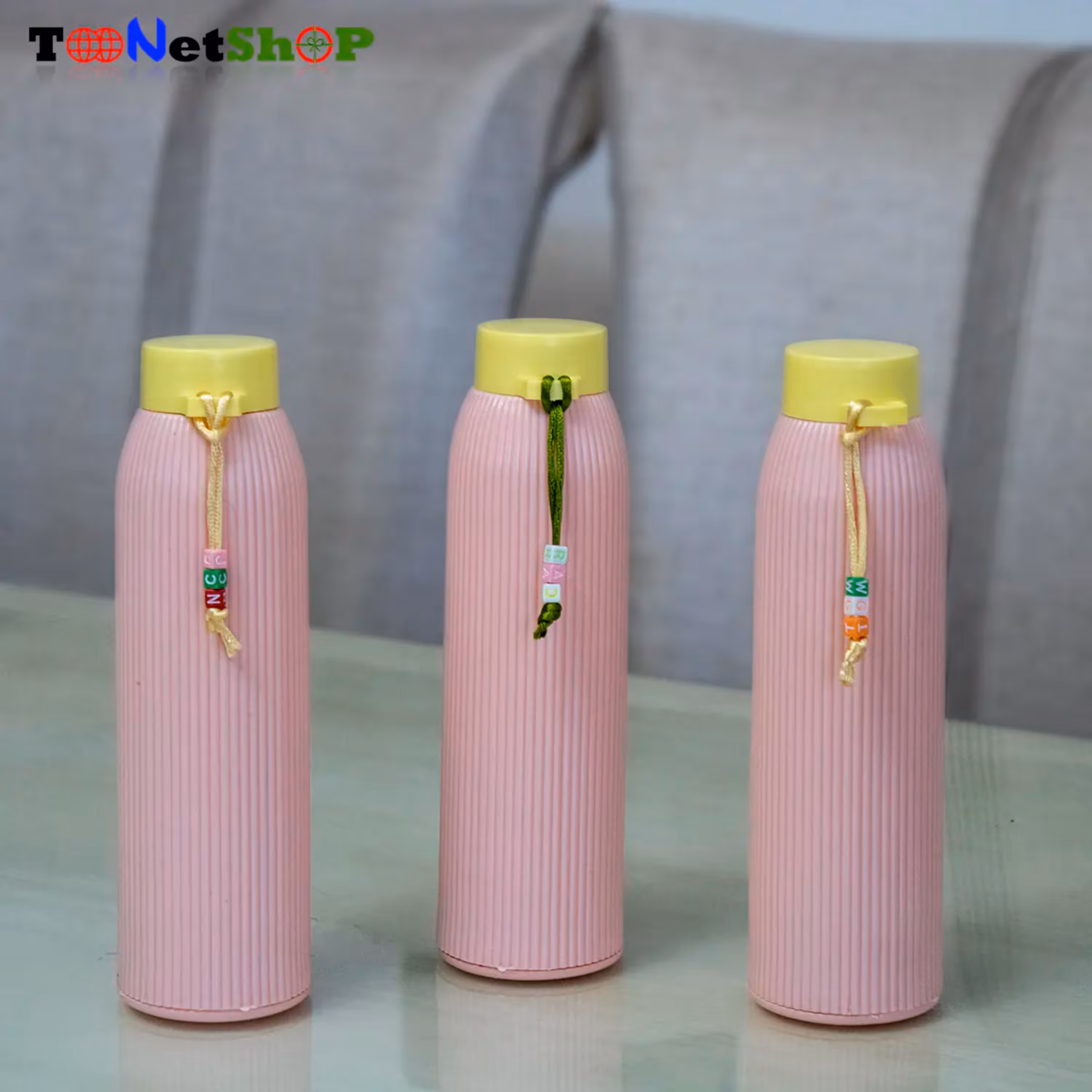 قمقمه شیشه ای روکش دار صورتی همراه با بند دستی