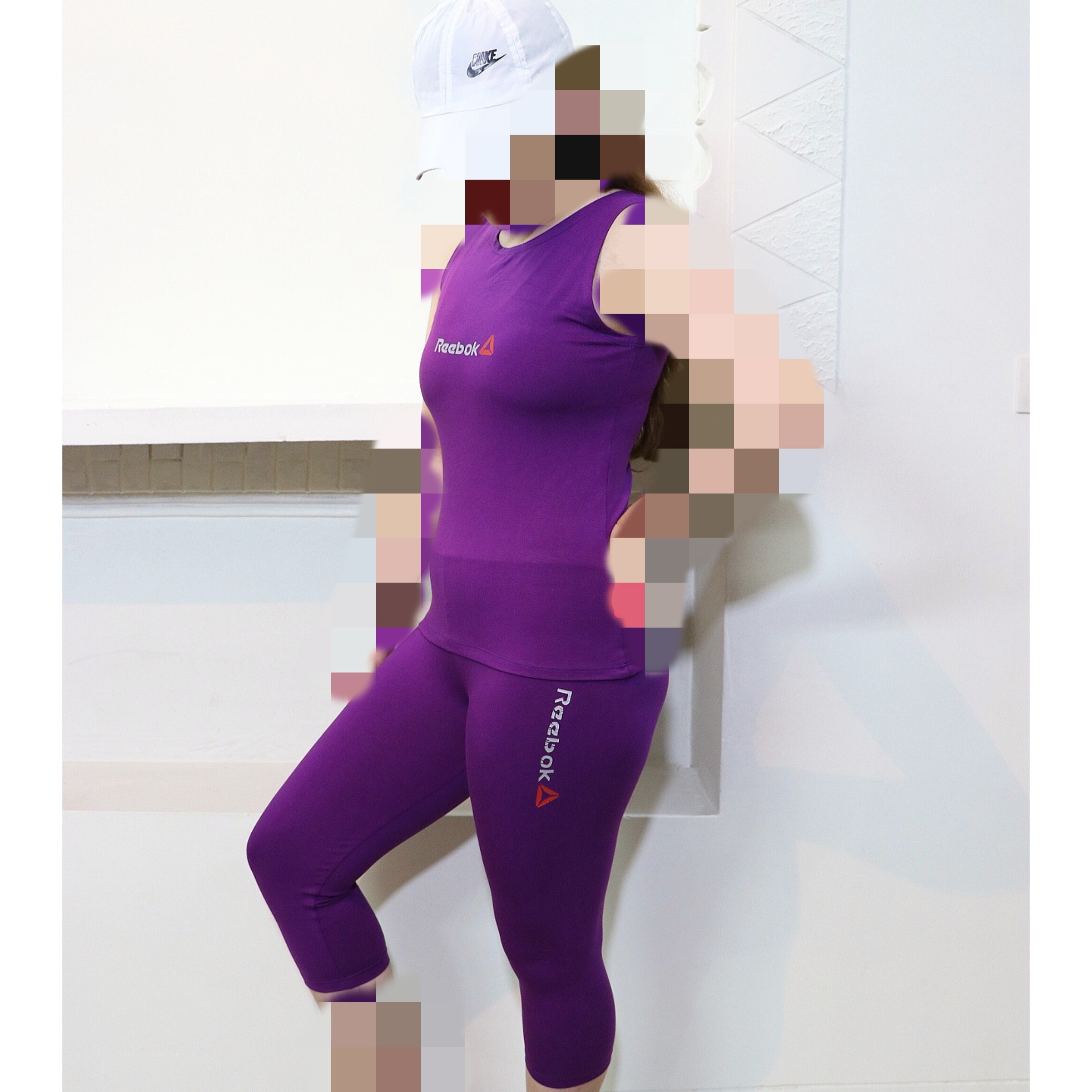 ست تاب شلوارک ورزشی  ریبوک reebokزنانه فری سایز بنفش  دارای رنگ بندی سوپر نخ پنبه 