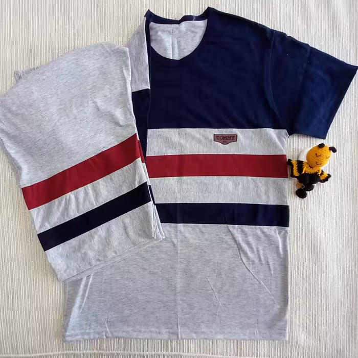 ست  تاپ و شلوارک ورزشی  تامی ملانژ نخ پنبه جینی و عمده  قیمت هر سایز متفاوت هست 