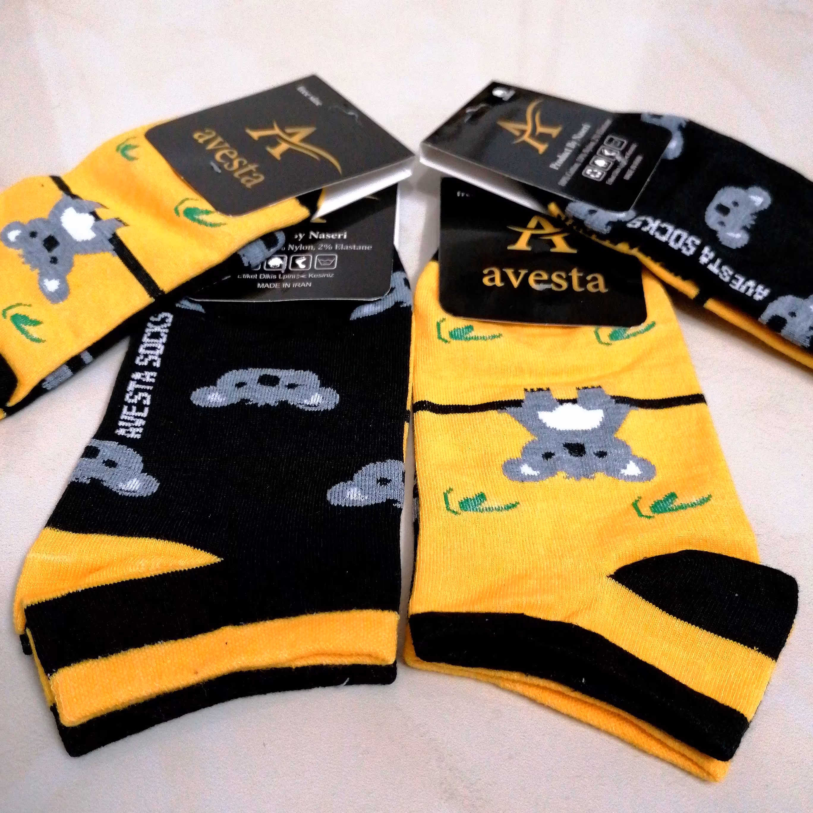 جوراب تابه تا (6جفتی) فری سایز طرح کوالا رنگ مشکی و زرد فانتزی