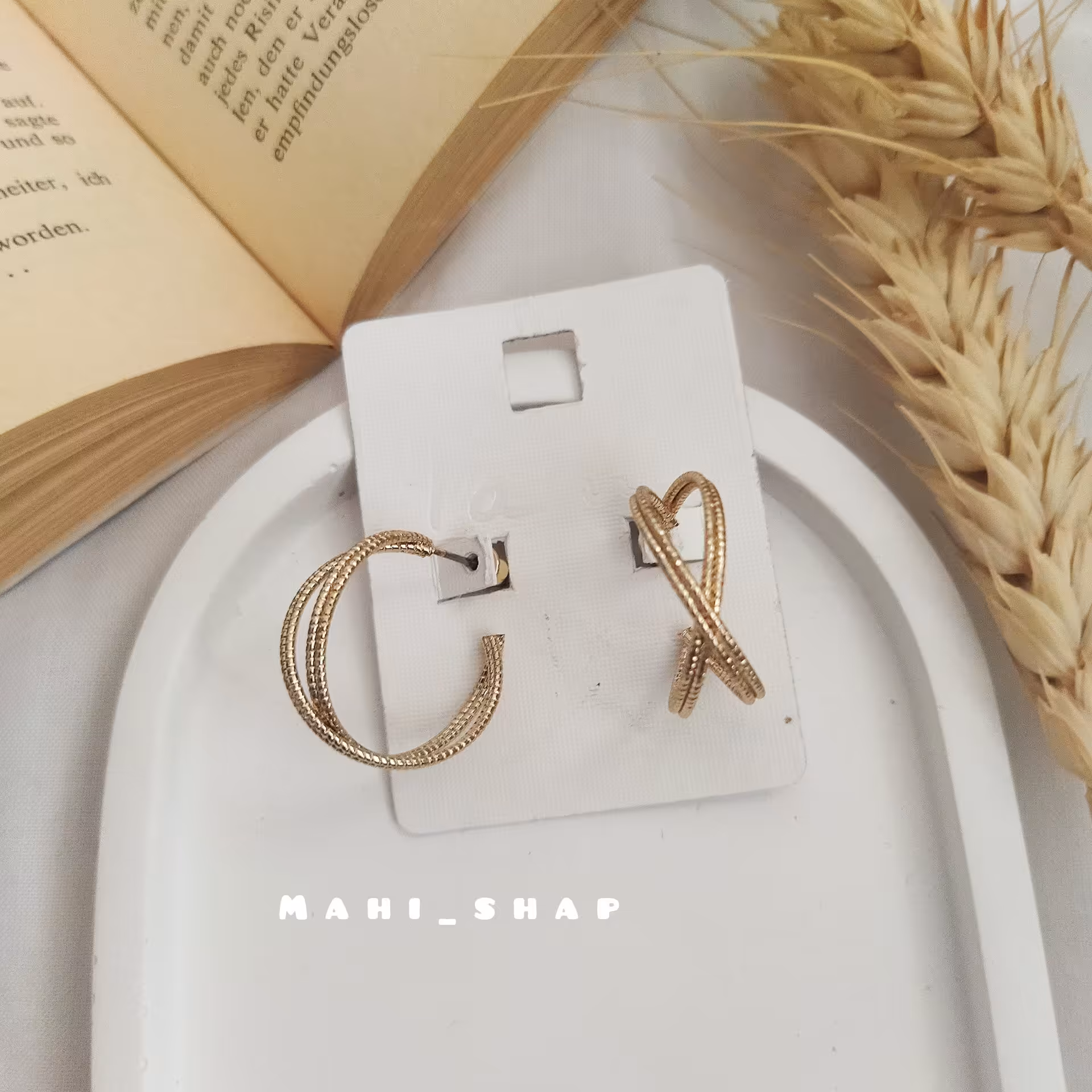 گوشواره‌ضربدری طلایی دایره‌ای