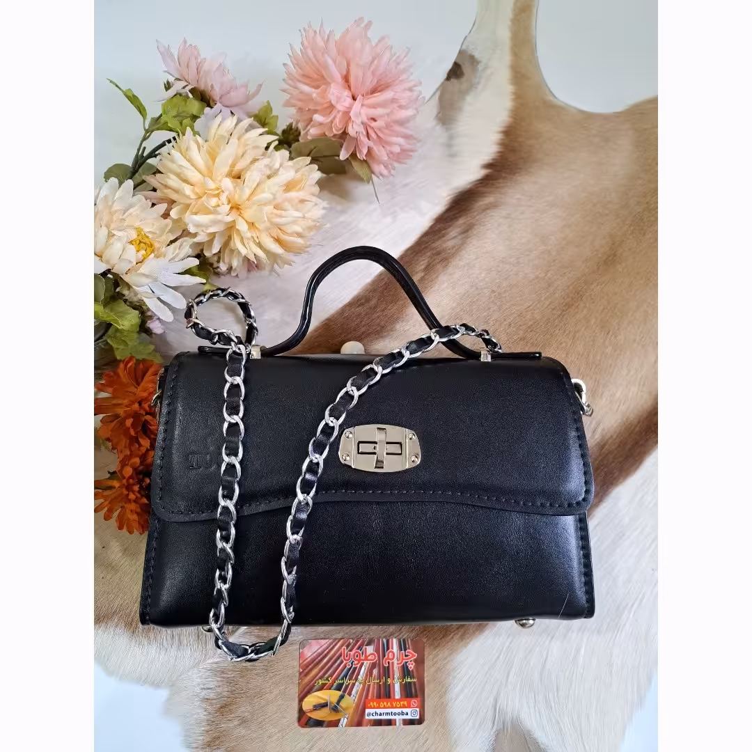 کیف مجلسی زنانه چرم طبیعی گاوی کاملأ دستدوز ودست ساز  ابعاد 24در 15 پهنا 9