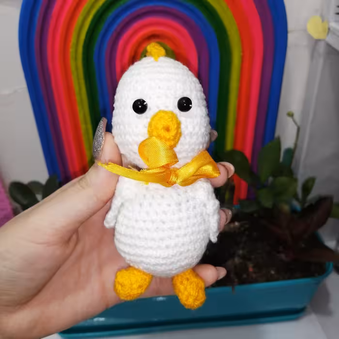عروسک بافتنی دست بافت طرح اردک زرد 