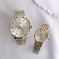 ست ساعت زنانه و مردانه بند استیل دو رنگ طلایی صفحه سفید