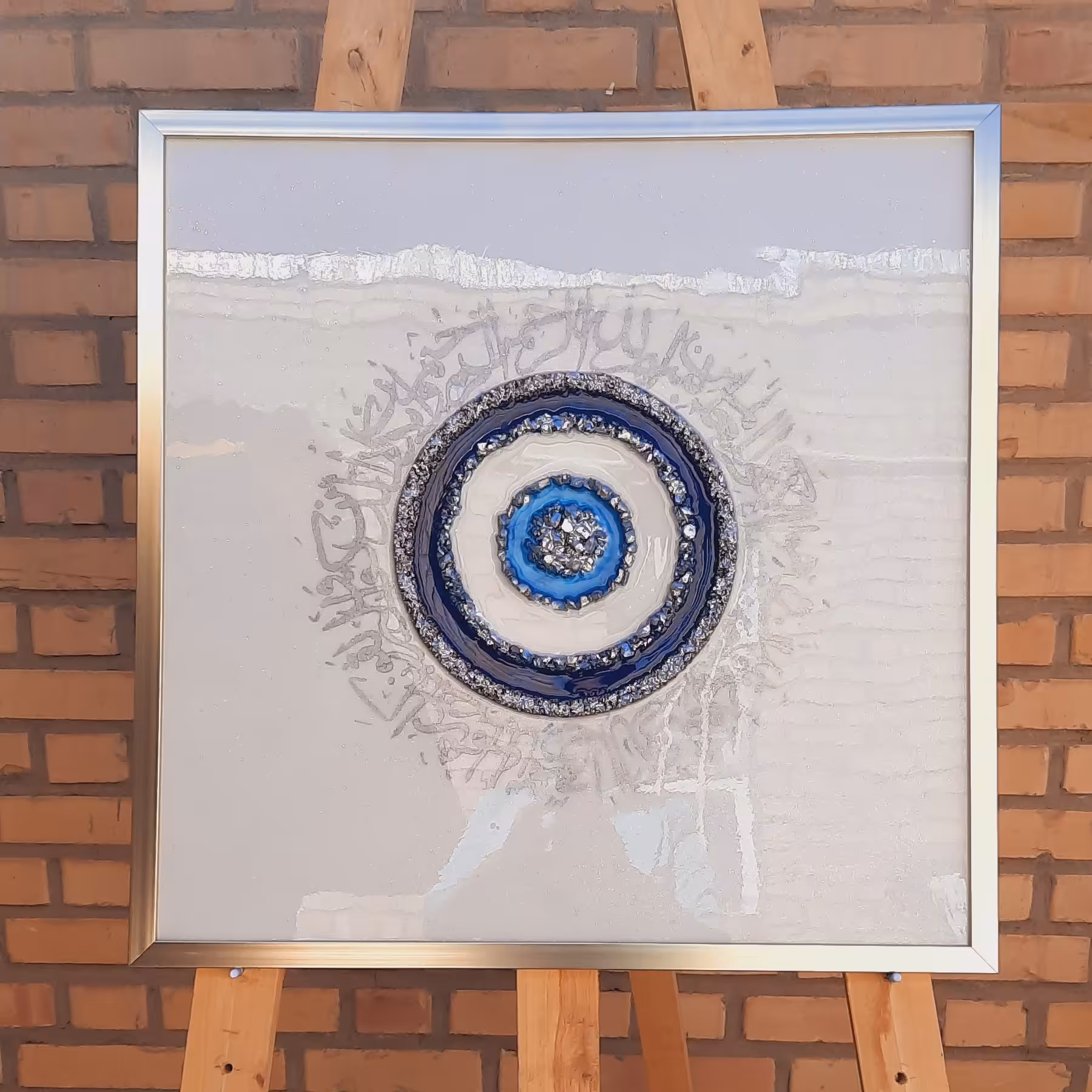 تابلوی دکوری وانیکاد به همراه چشم نظر با قاب نقره ای سایز 60 در 60