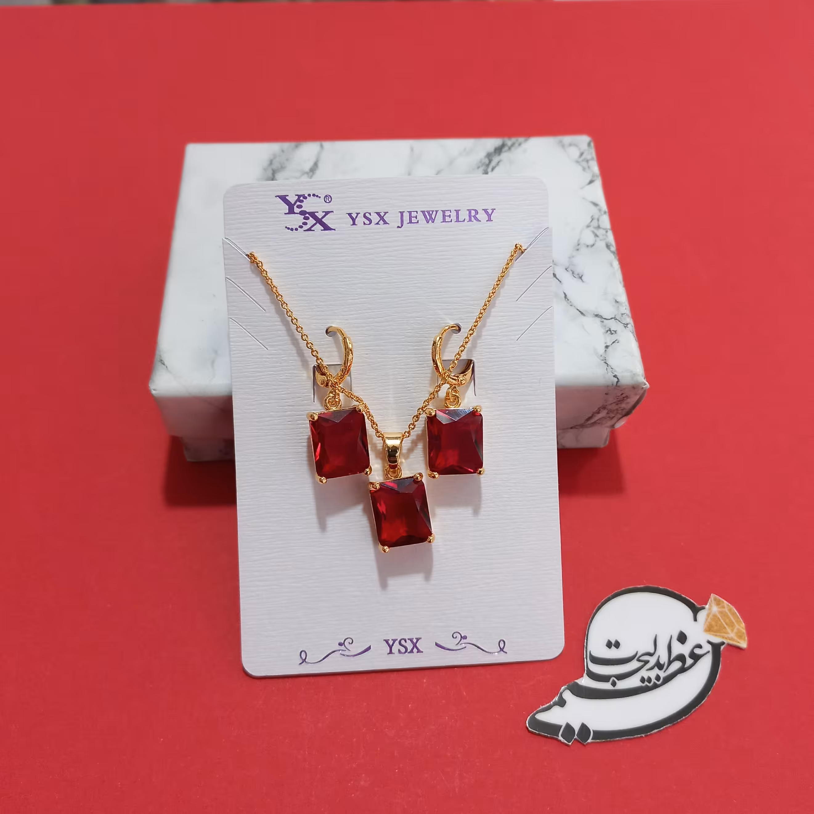 نیم ست برند Ysx از جنس مس و روکش طلا بسیار زیبا با نگینهای قرمز