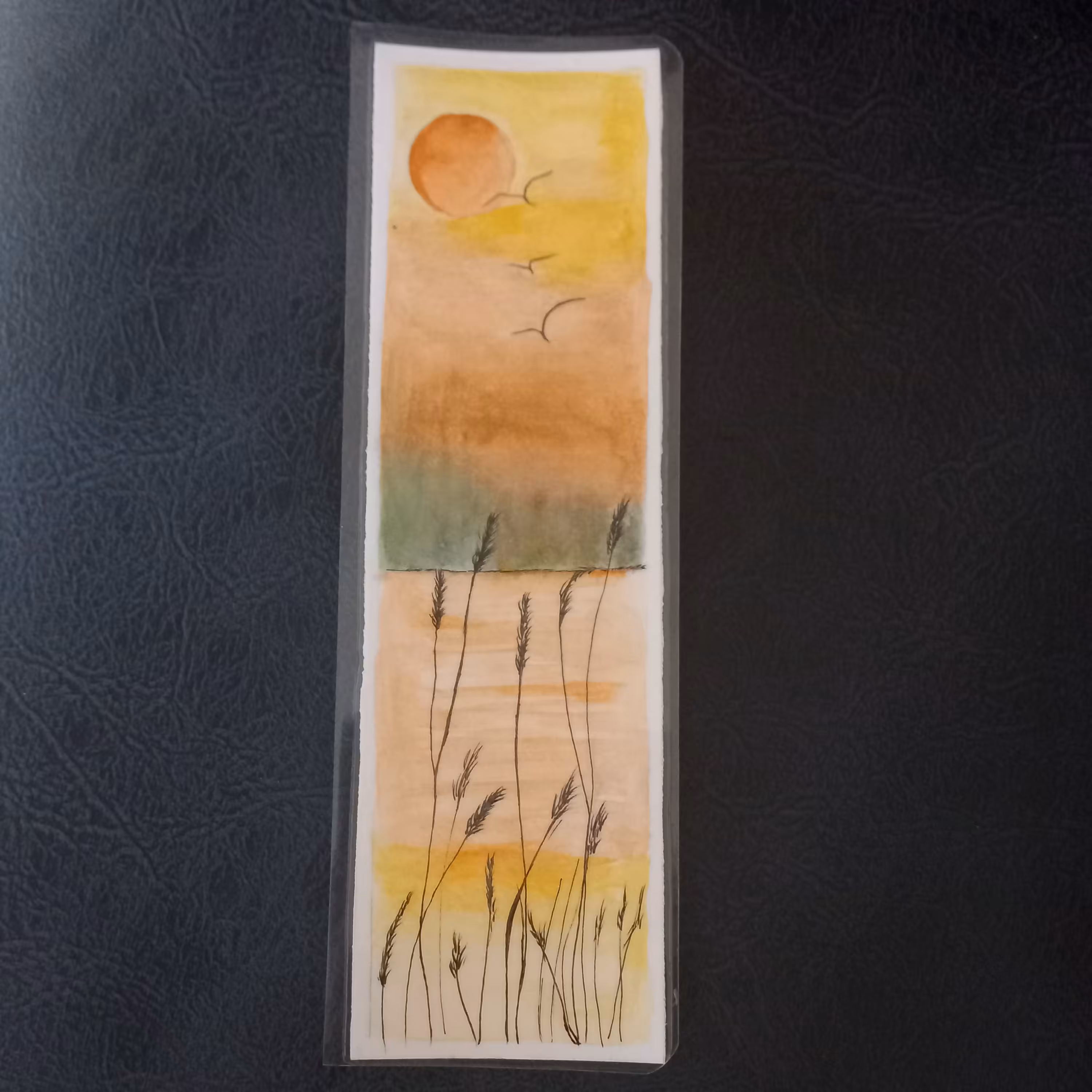 نشانگر کتاب نقاشی شده روی مقوا و لمینت شده طرح غروب