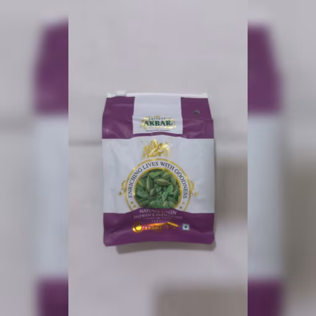 هل سبز دانه درشت برند اکبر وارداتی در بسته بندی کارخانه پلمپ 100 گرمی