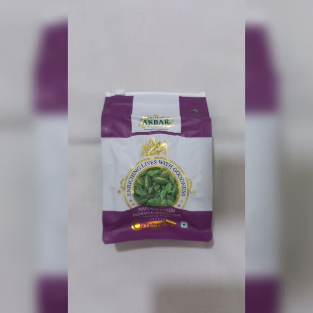 هل سبز دانه درشت برند اکبر وارداتی در بسته بندی کارخانه پلمپ 100 گرمی