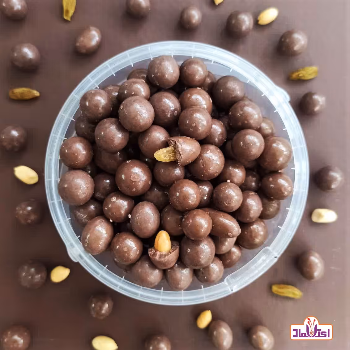 دراژه کاکائویی مغزدار 100 گرمی اعتماد ( کاکائو آجیلی )