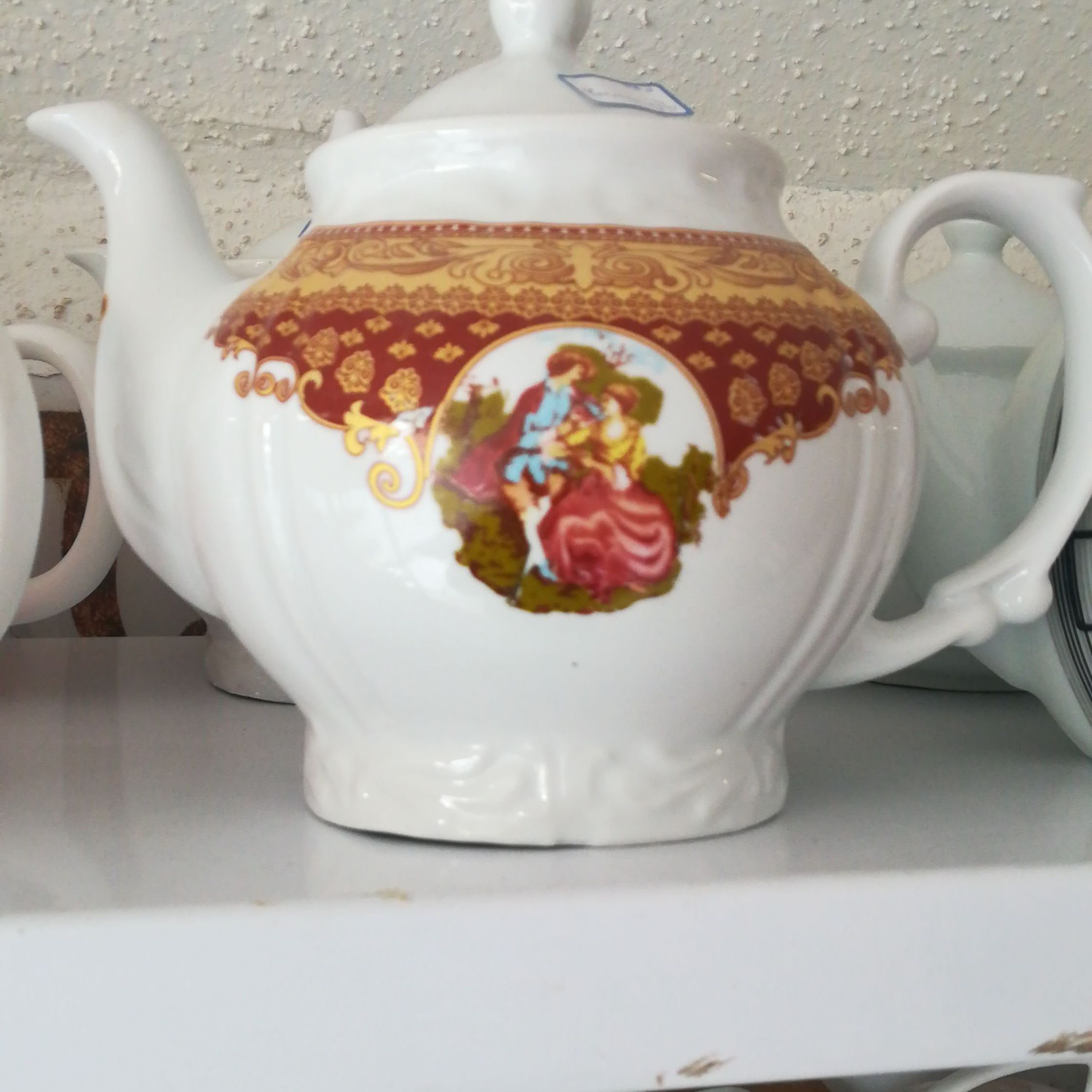 قوری چینی گل رنگ طلایی