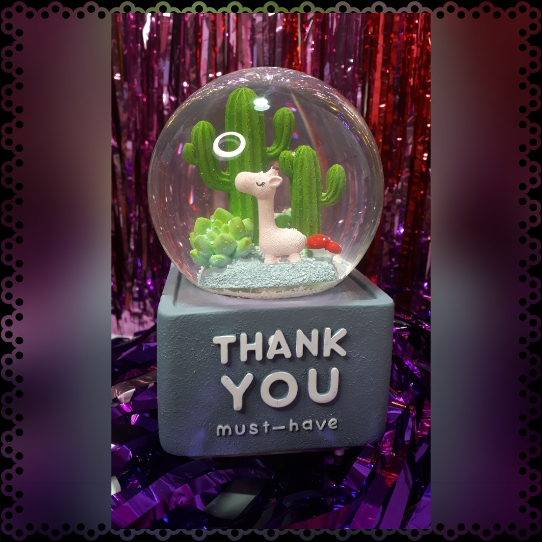 گوی موزیکال پمپی طرح زرافه و کاکتوس