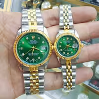 ساعت رولکس ست زنانه و مردانه صفحه سبز خاص تقویم دار رنگ ثابت استیل ضدآب ارسال رایگان با جعبه همراه با فیلم تست ضد اب