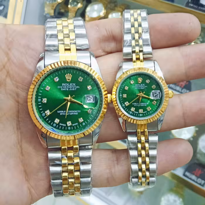 ساعت رولکس ست زنانه و مردانه صفحه سبز خاص تقویم دار رنگ ثابت استیل ضدآب ارسال رایگان با جعبه همراه با فیلم تست ضد اب