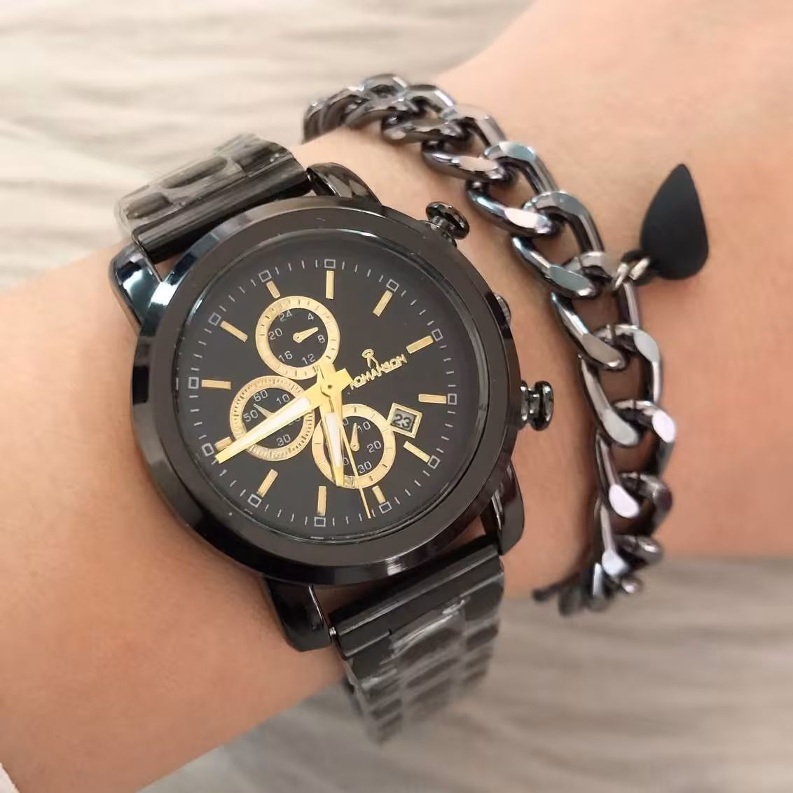 ساعت رومانسون مشکی ب همراه  دستبند