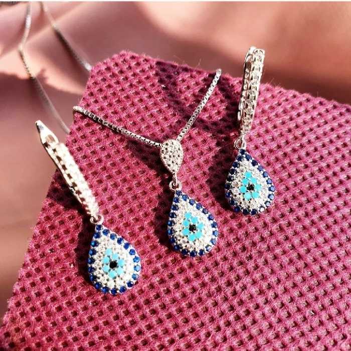 نیمست نقره با زنجیر  چشم نظر اشکی ظریف و خاص عیار 925 و آبکاری طلاسفید  زنجیر  ونیزی با ضخامت متوسط،و طول 40 سانتیمتر