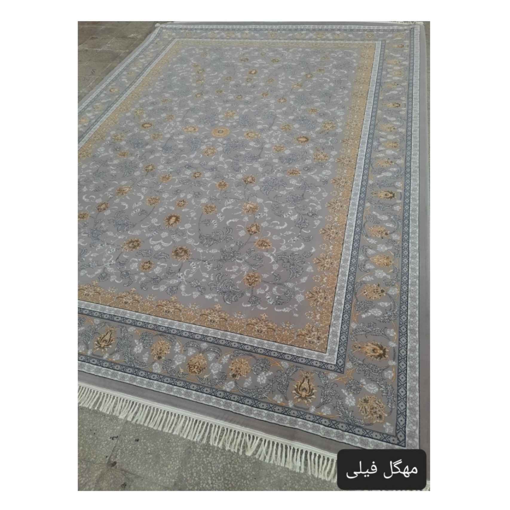 فرش ماشینی ارزان قیمت  500 شانه 9 متری طرح 700 مدل  مهگل رنگ فیلی
