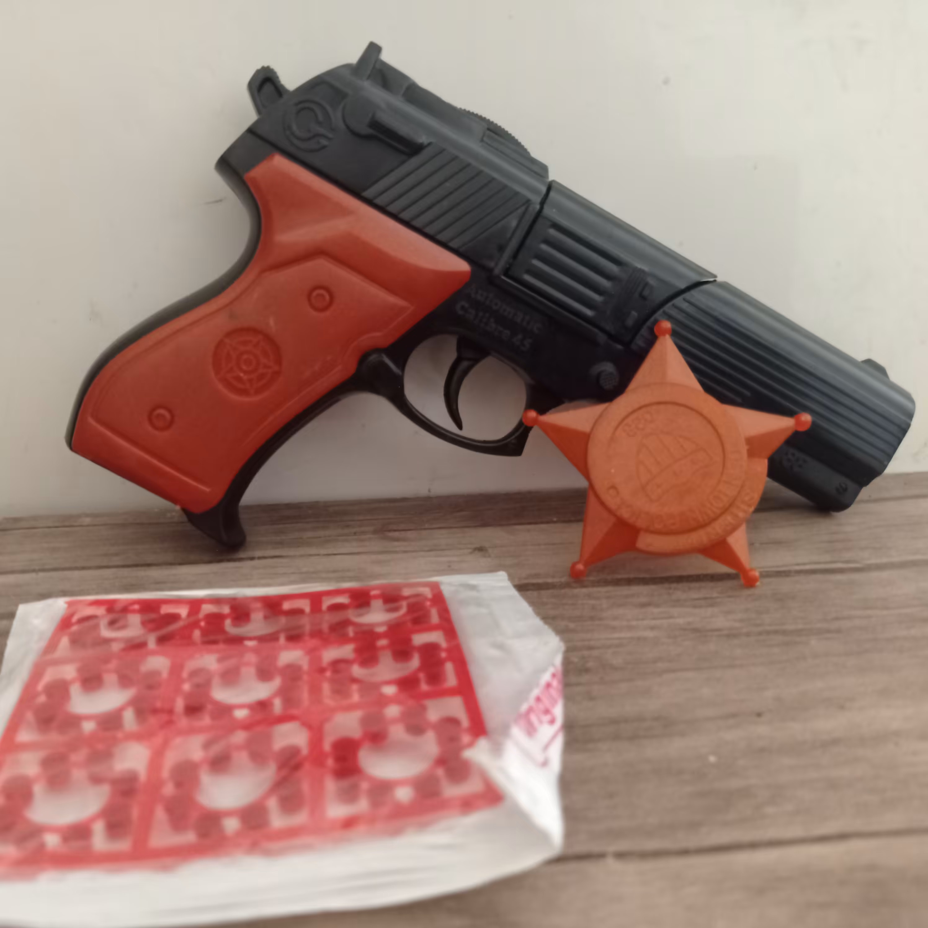 تفنگ ترقه ی خشاب دکمه دار