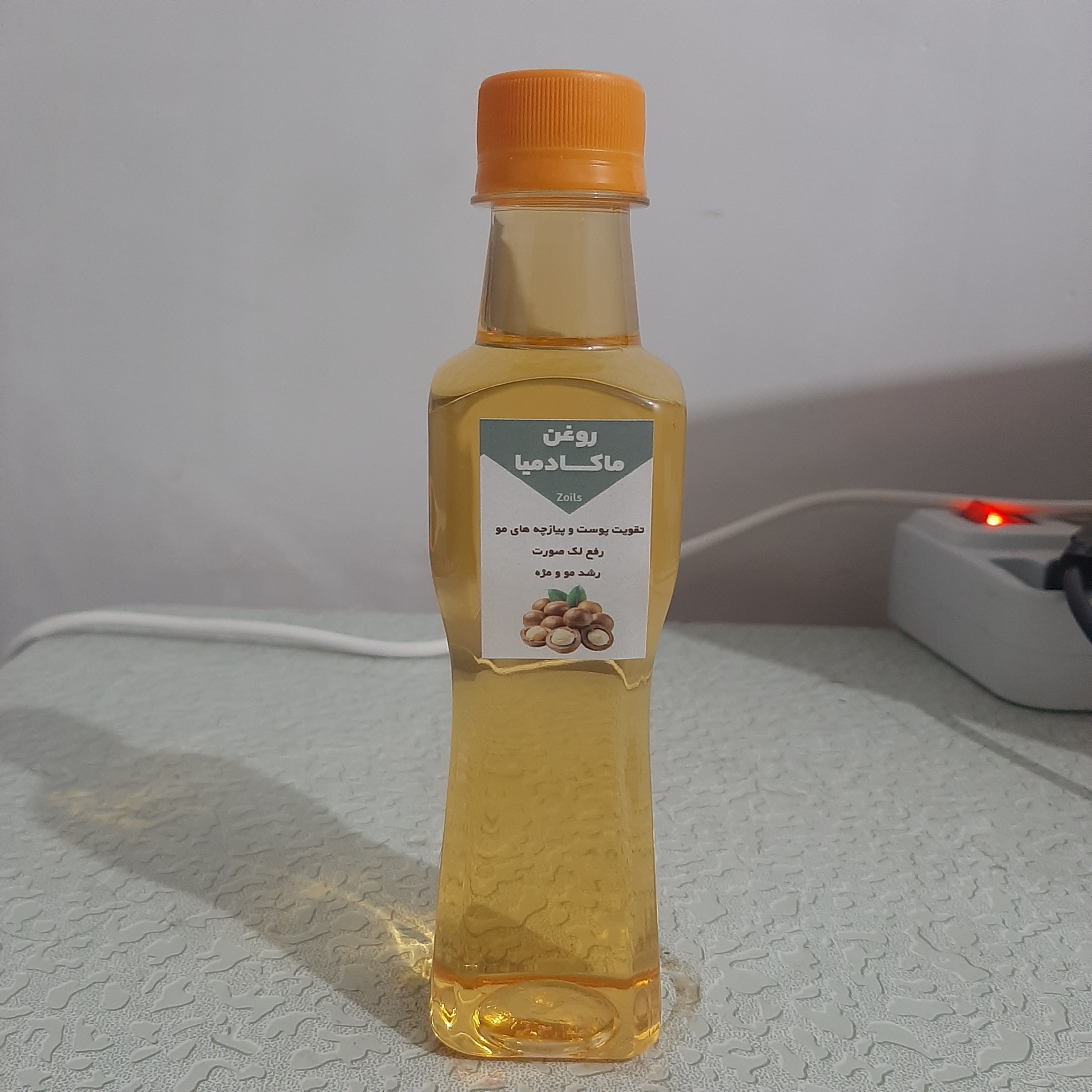 روغن ماکادمیا ربع لیتری اصل و خالص 