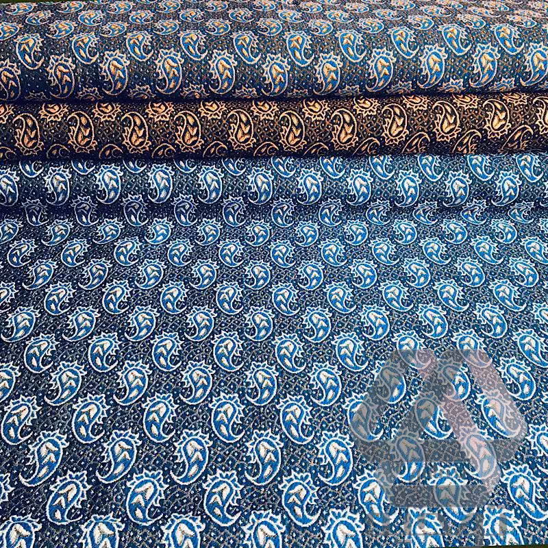 پارچه ترمه طرح بته جقه با عرض 1 متر رنگ قهوه ای