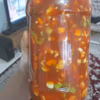 ترشی گوجه خانگی تازه وارگانیک طبق شما بصورت تازه آماده میشه بابهترین کیفیت