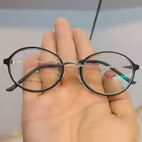 عینک طبی با عدسی آنتی رفلکس بدون نمره مخصوص کامپیوتر گوشی و گوشی موبایل جنسیت فریم تمام قاب کایوچو و فلزی همراه با جلد و