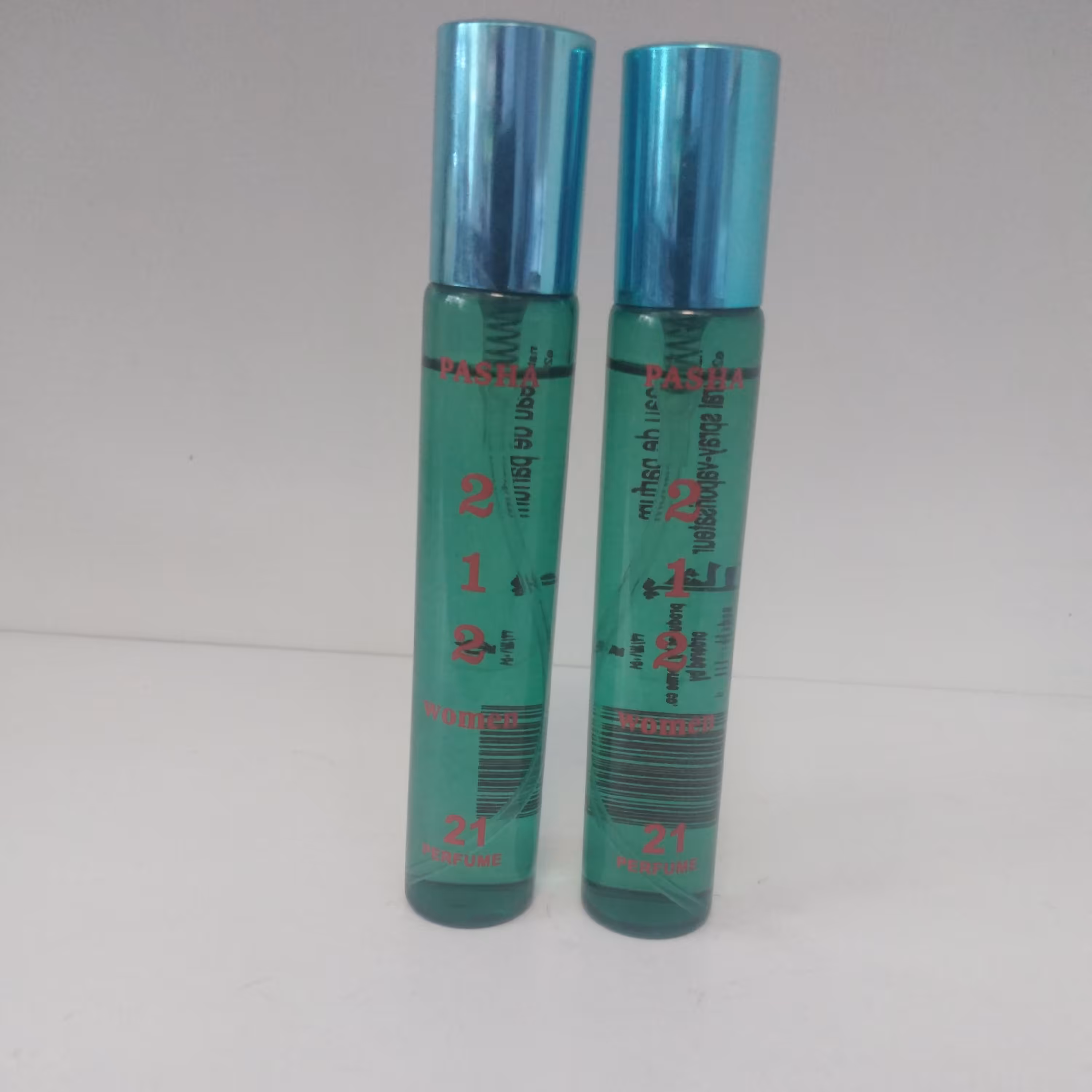 عطر جیبی زنانه پاشا مدل 212 حجم 24 میلی لیتر