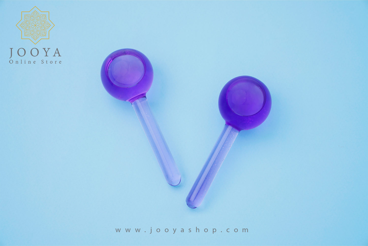 ماساژور دستی شیشه ای مدل گوی یخی بنفش