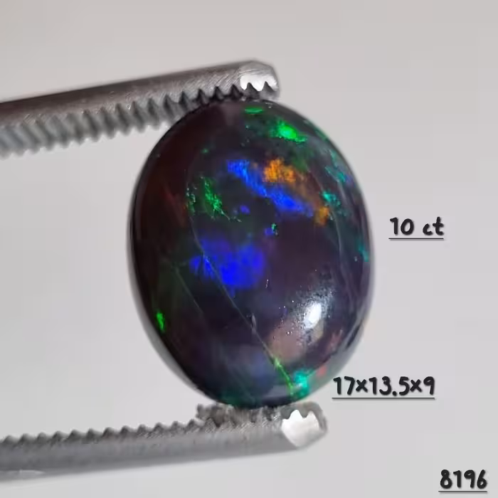 نگین اوپال سیاه اتیوپی هفت رنگ وزن 10 قیراط کد 8196